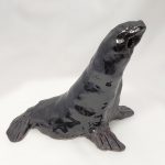 6-inch hand-built, stoneware sculpture of a saucy sealion, by Peggy Grigor
